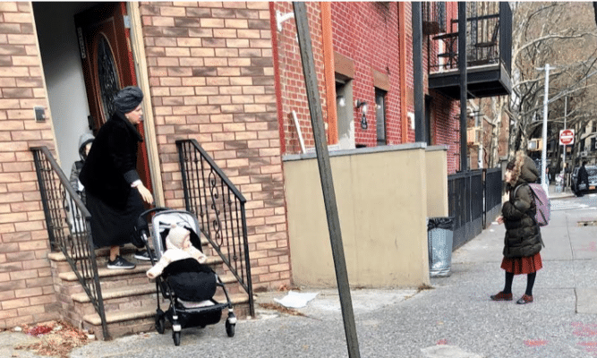 Female day laborer tries to get work in Bushwick, Brooklyn. Photo by Natalia Gonzalez