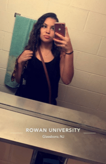 Picture of Ashley Vargas, a young woman, taking a selfie at Rowan University