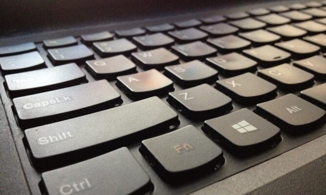Black laptop keyboard: left side. Lenovo G500. Windows start button.