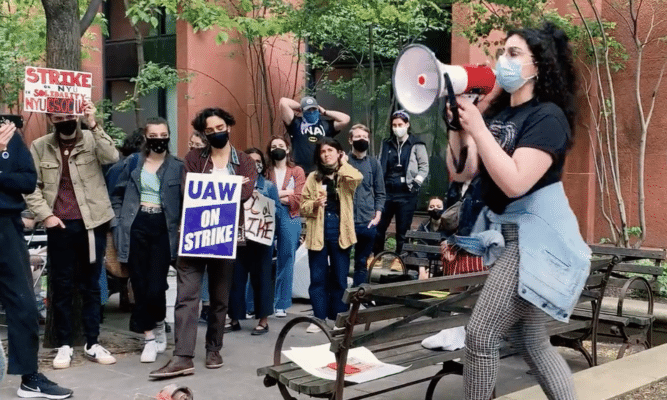 Woman with a bullhorn at NYU