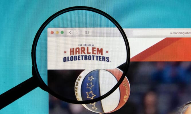 harlem-globetrotters-logo-on-a-computer-screen-with-a-magnifying-glass_cc-by-20.jpg