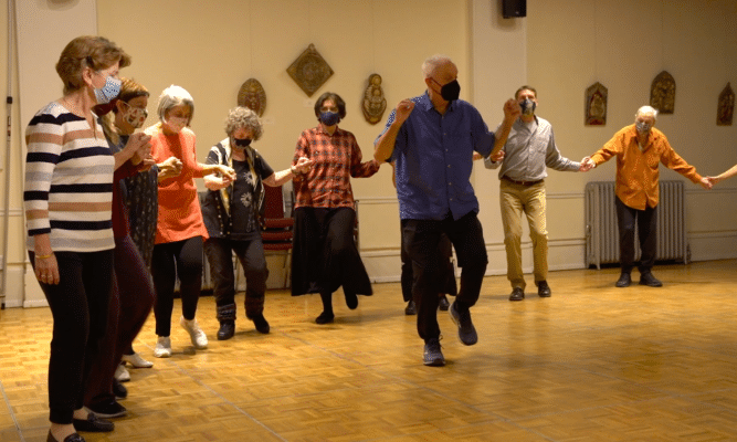 Michael Ginsburg teaching Balkan dancing