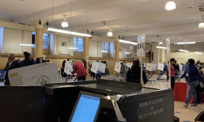 Voters in polling place