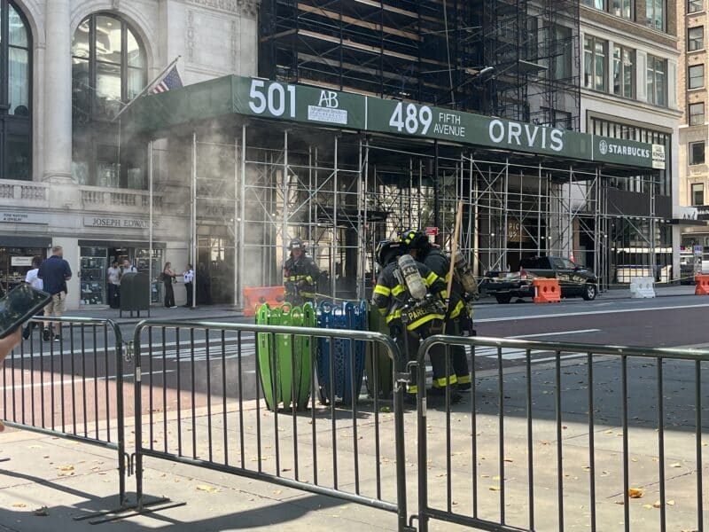 Smoking trash can on the corner of 42nd street and Fifth Avenue. Photo by Jennifer Garcia.