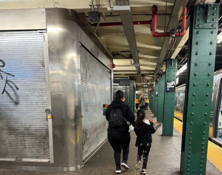 Mother and child candy seller in the subway