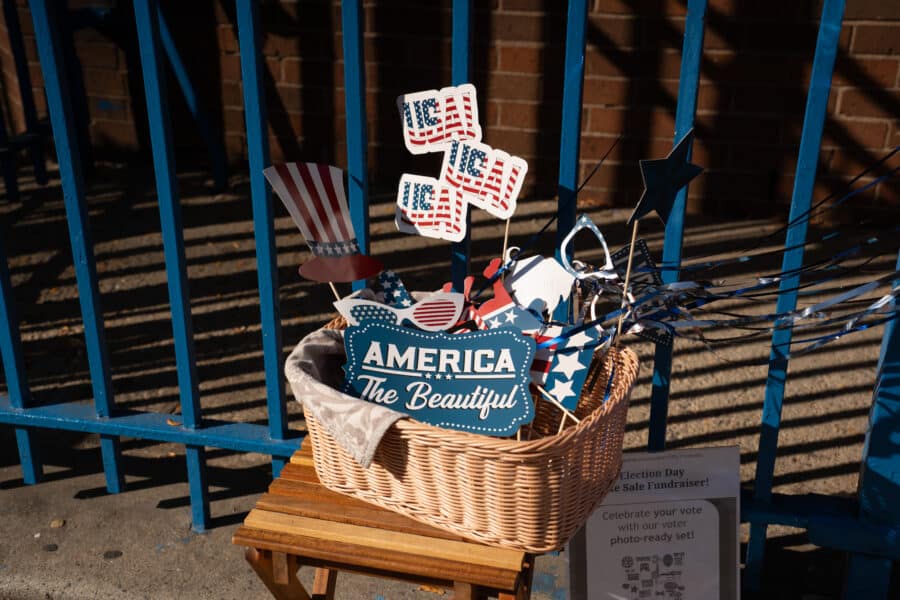 Flags and America the Beautiful in a basket. Photo by Muhammed Irfan