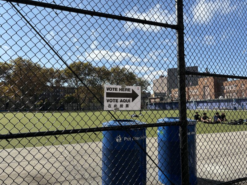 Vote here sign outside of school yard. Photo by Dayna Michels