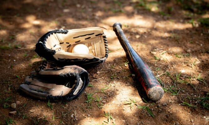 Bat, gloves and baseball