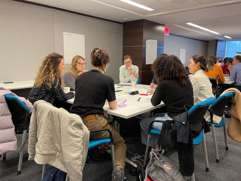 Chris Bobko with students at a design thinking workshop run by Immense at Deloitte and sponsored by Blackstone Launchpad.