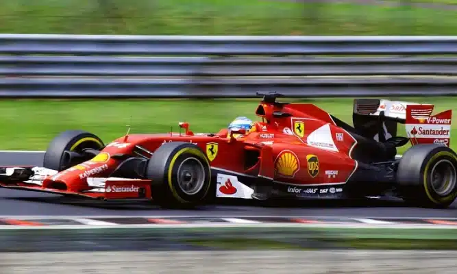 A Ferrari Team Formula 1 car in motion.