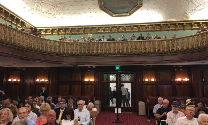 New Yorkers at a City Hall Hearing