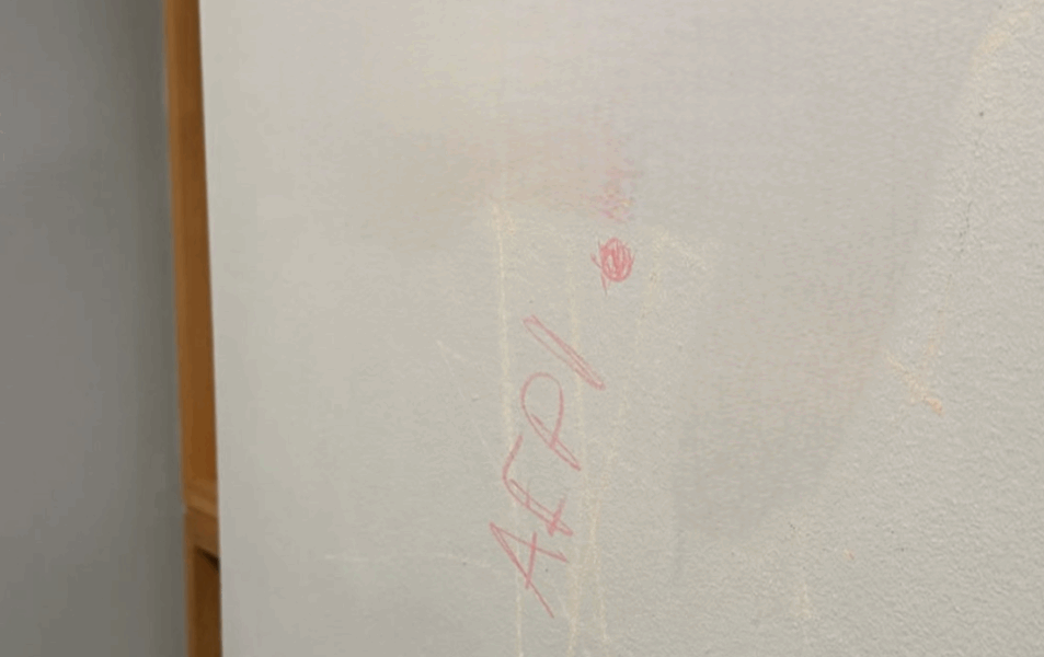 Defaced sign in Muslim 
