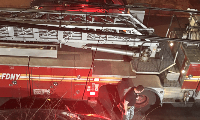 Fire Truck in front of a Bronx Building