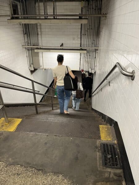 Going down the subway steps