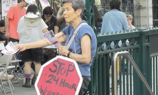 Screen shot of home healthcare worker protesting.