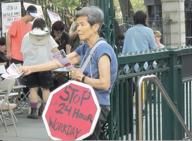 Screen shot of home healthcare worker protesting.