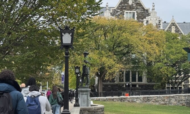 Students Walking toward Shepard Hall