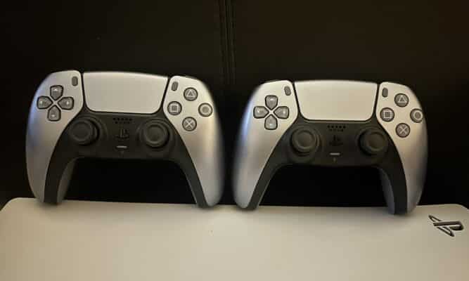 Two game controllers side-by-side.