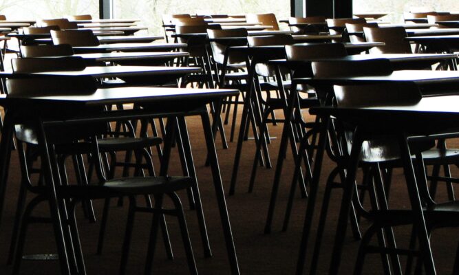 a room full of desks.