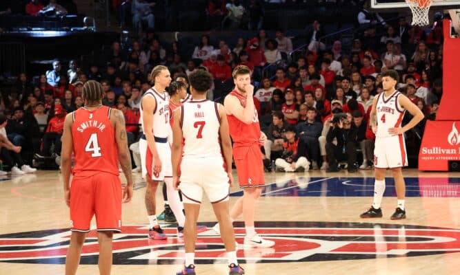 St. John’s and Rutgers basketball players during a game.